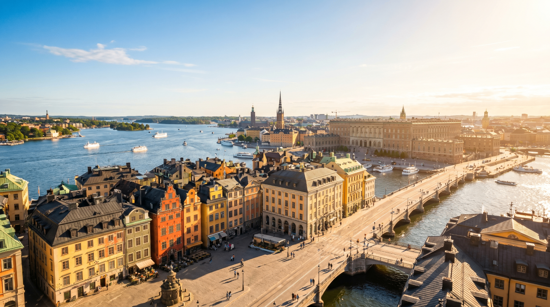 Aerial view of a historic European waterfront city at golden hour